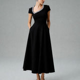 ASİMETRİK YAKA İŞLEME DETAYLI KLOŞ ETEKLİ MİDİ BOY KREP ELBİSE SİYAH